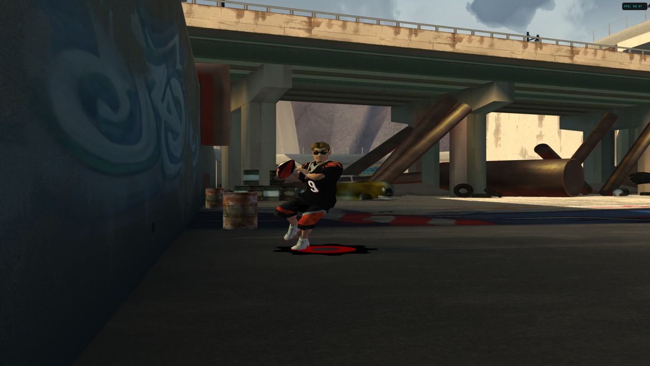 A quarterback throwing on the street court